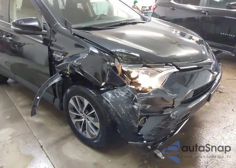 2018 Toyota Rav4 Hybrid Xle z USA, uszkodzony, nr VIN JTMRJREV3JD196636